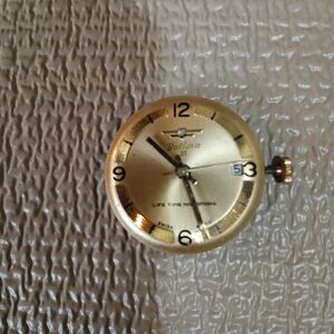 Bulova Gold and Cream Watch Face